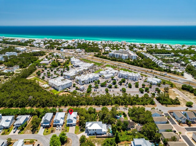aerial perspective of suburban area featuring a nearby body of water