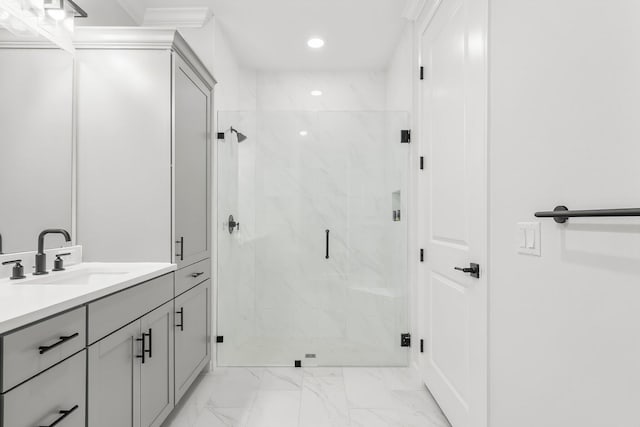 bathroom with vanity, marble finish floor, a marble finish shower, and recessed lighting