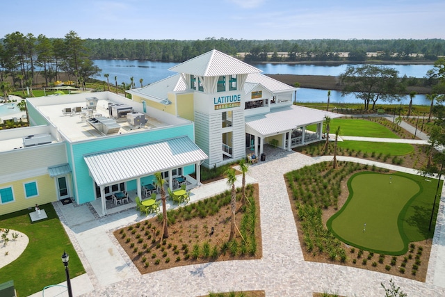 birds eye view of property featuring a water view