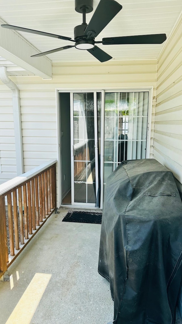 view of patio with grilling area and a ceiling fan
