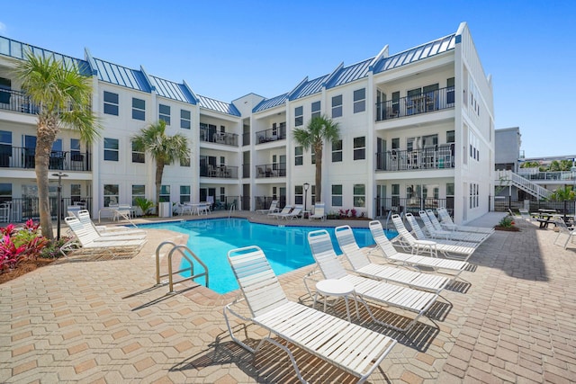pool featuring a patio