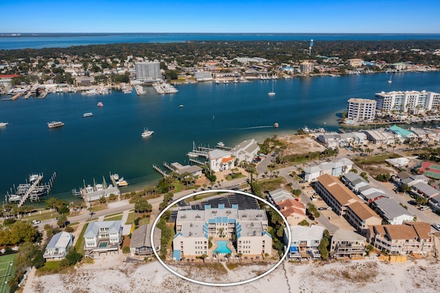 drone / aerial view with a view of city and a water view