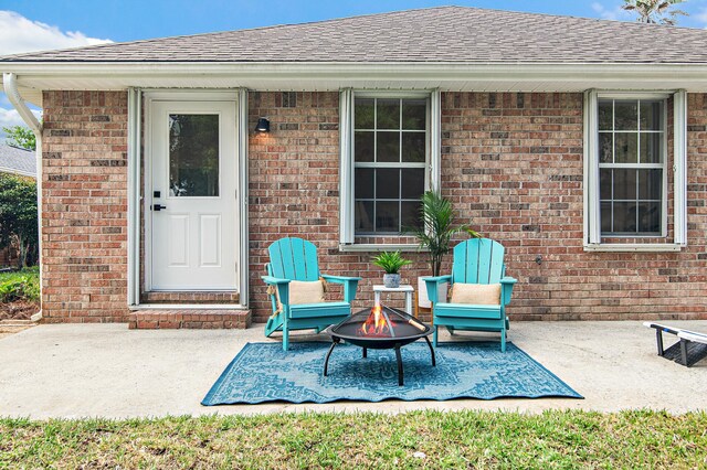 exterior space with a fire pit