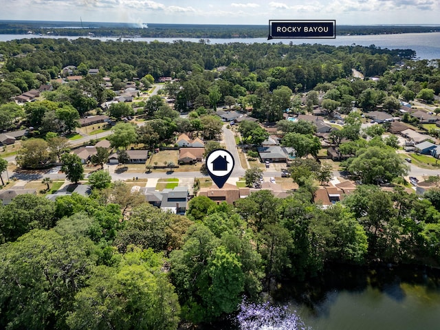 bird's eye view featuring a water view and a residential view