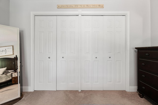 bedroom featuring carpet