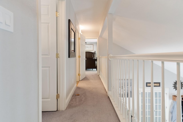 hallway with carpet