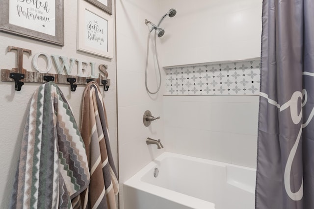 bathroom featuring shower / bath combo with shower curtain