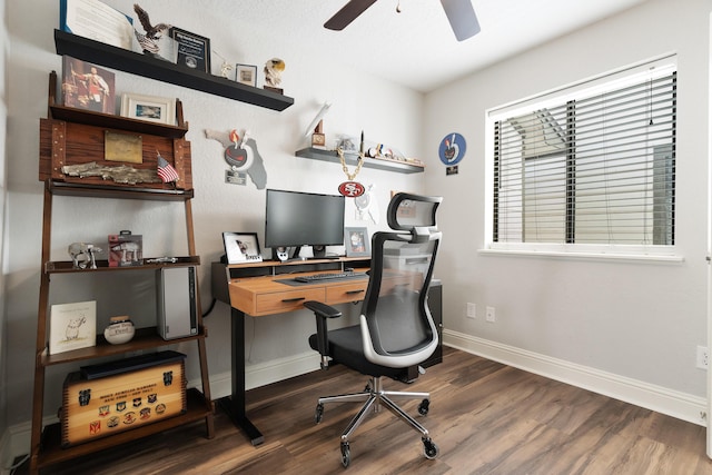 office space featuring wood finished floors, baseboards, and ceiling fan