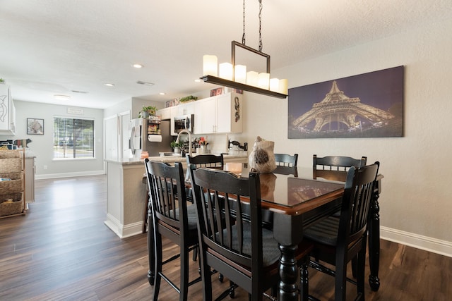 dining space featuring baseboards, visible vents, recessed lighting, and dark wood-type flooring