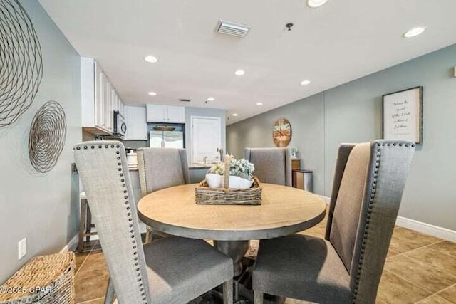 16701 Front Beach Rd Unit 2307, Panama City Beach, FL 32413 - dining space featuring light tile patterned flooring, visible vents, recessed lighting, and baseboards