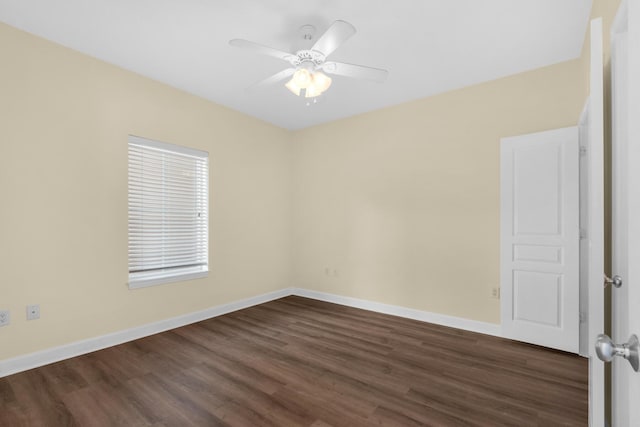 113 SE Brooks St Unit 201, Fort Walton Beach, FL 32548 - unfurnished room featuring baseboards, a ceiling fan, and dark wood-style floors