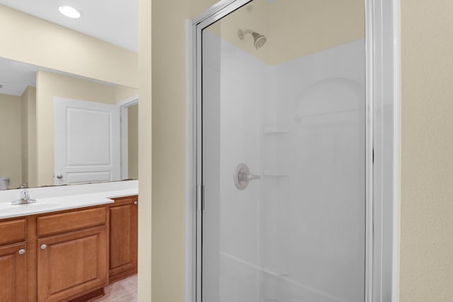 113 SE Brooks St Unit 201, Fort Walton Beach, FL 32548 - full bathroom featuring tile patterned floors, a shower stall, and vanity