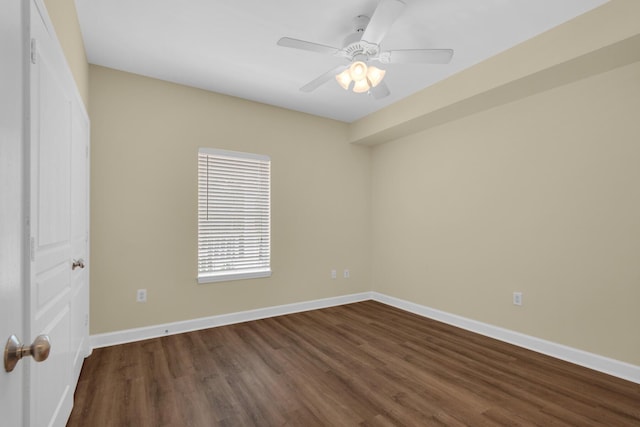 113 SE Brooks St Unit 201, Fort Walton Beach, FL 32548 - spare room featuring baseboards and dark wood-style flooring
