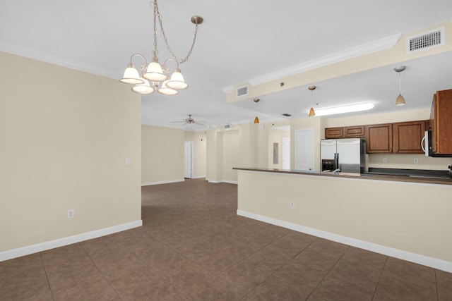 113 SE Brooks St Unit 201, Fort Walton Beach, FL 32548 - kitchen with visible vents, ornamental molding, dark countertops, and stainless steel appliances