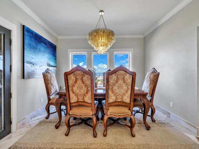 dining space with a chandelier, baseboards, ornamental molding, and a healthy amount of sunlight