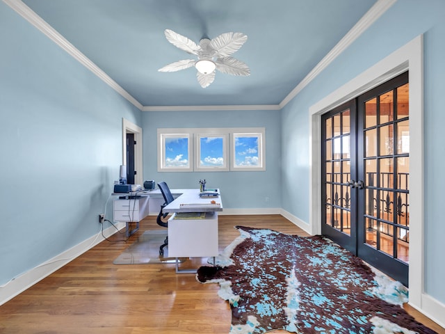 home office featuring ornamental molding, wood finished floors, french doors, and baseboards