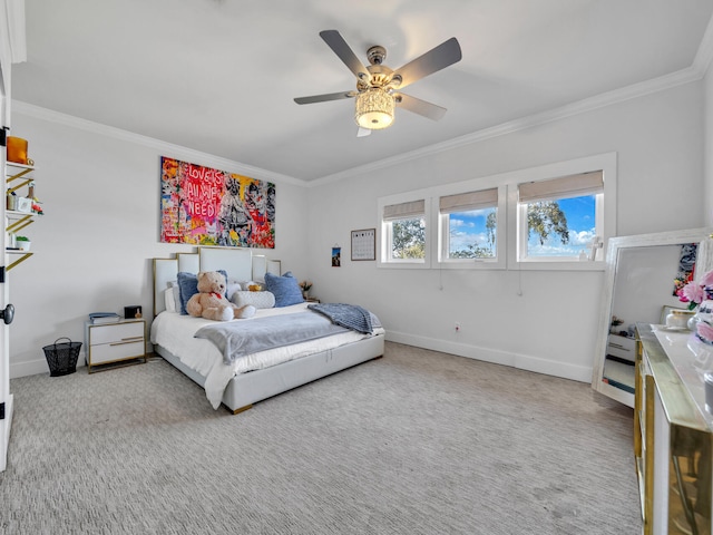 carpeted bedroom featuring crown molding and baseboards