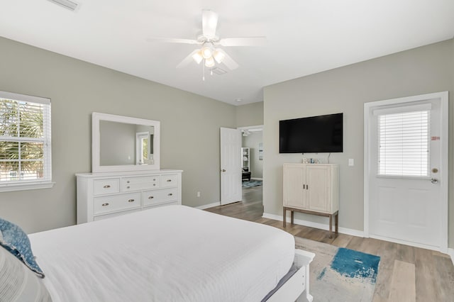 597 Avalon Blvd, Miramar Beach, FL 32550 - bedroom featuring baseboards, light wood-style flooring, and ceiling fan