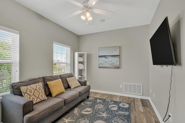 597 Avalon Blvd, Miramar Beach, FL 32550 - living room with baseboards, a ceiling fan, wood finished floors, and visible vents