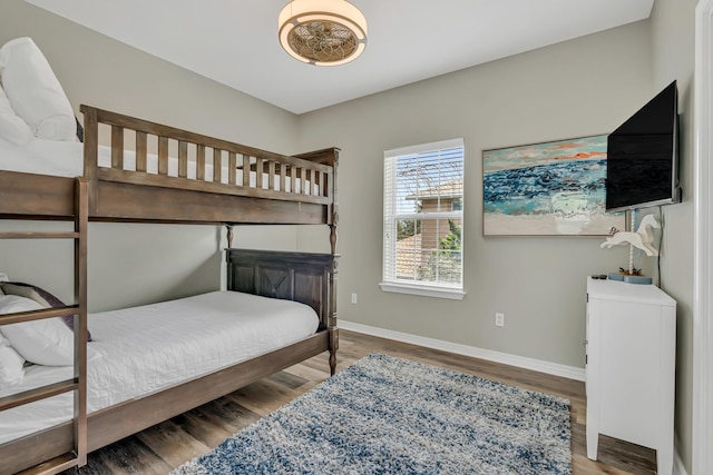 597 Avalon Blvd, Miramar Beach, FL 32550 - bedroom with baseboards and wood finished floors