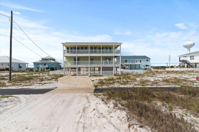 8054 Gulf Blvd, Navarre, FL 32566 - rear view of property featuring driveway and a balcony