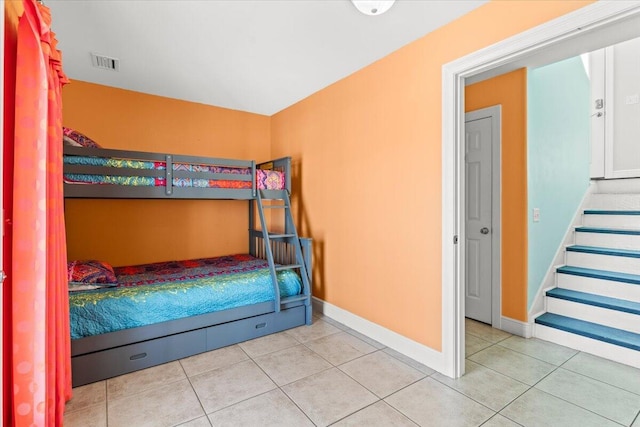 8054 Gulf Blvd, Navarre, FL 32566 - bedroom featuring visible vents, baseboards, and tile patterned floors
