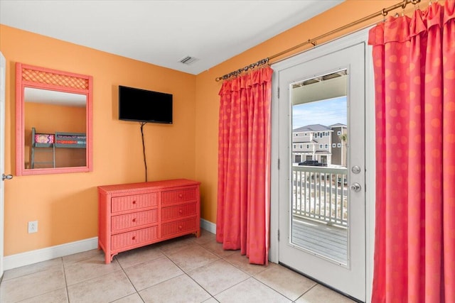 8054 Gulf Blvd, Navarre, FL 32566 - interior space with baseboards, visible vents, and light tile patterned floors
