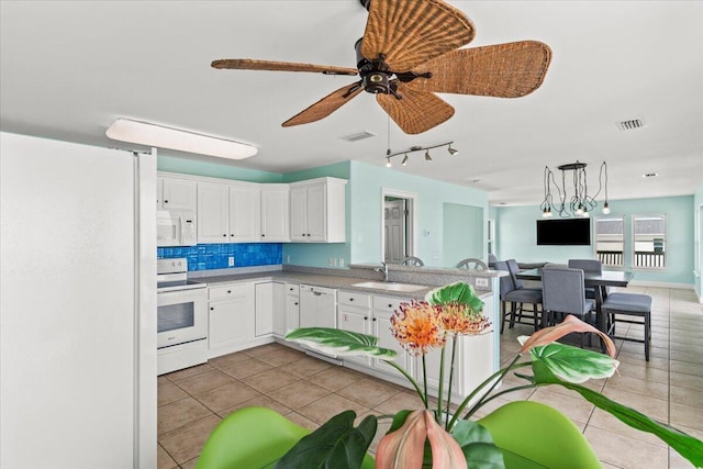 8054 Gulf Blvd, Navarre, FL 32566 - kitchen featuring light tile patterned flooring, a sink, white appliances, white cabinetry, and open floor plan