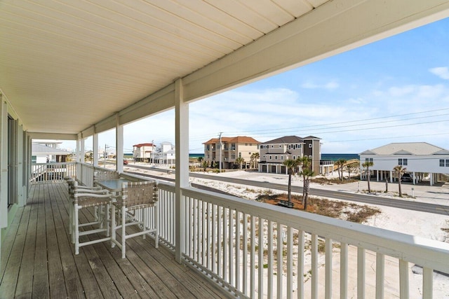 8054 Gulf Blvd, Navarre, FL 32566 - deck featuring a residential view and a porch