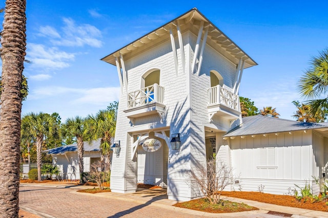 50 Cinnamon Fern Ln, Santa Rosa Beach, FL 32459 - beach home with board and batten siding and a balcony