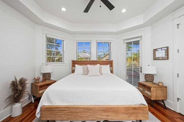 50 Cinnamon Fern Ln, Santa Rosa Beach, FL 32459 - bedroom featuring recessed lighting, a raised ceiling, access to outside, and wood finished floors