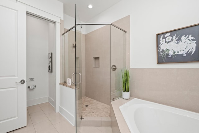 50 Cinnamon Fern Ln, Santa Rosa Beach, FL 32459 - bathroom featuring a bath, tile patterned flooring, a shower stall, and recessed lighting