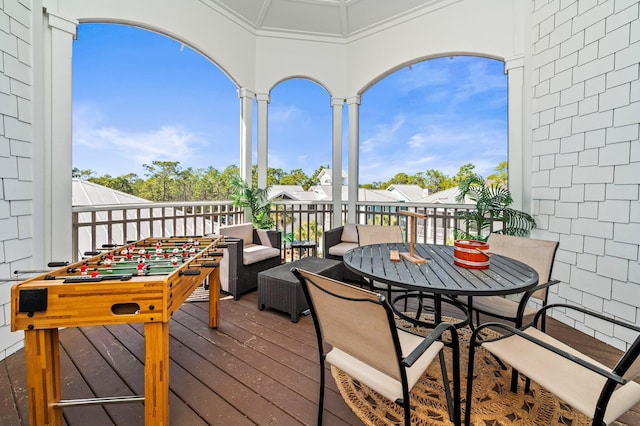 50 Cinnamon Fern Ln, Santa Rosa Beach, FL 32459 - wooden terrace with an outdoor hangout area and outdoor dining space