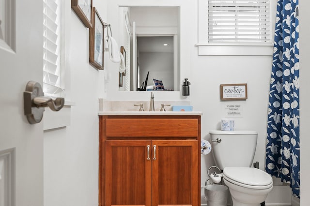 50 Cinnamon Fern Ln, Santa Rosa Beach, FL 32459 - bathroom featuring toilet, vanity, and curtained shower