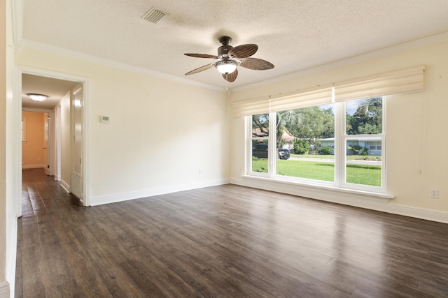 361 NE Gardner Dr, Fort Walton Beach, FL 32548 - spare room with ornamental molding, dark wood-type flooring, a ceiling fan, a textured ceiling, and baseboards