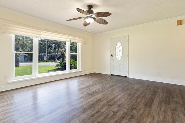 361 NE Gardner Dr, Fort Walton Beach, FL 32548 - foyer featuring healthy amount of natural light, ornamental molding, dark wood-style flooring, a textured ceiling, and ceiling fan