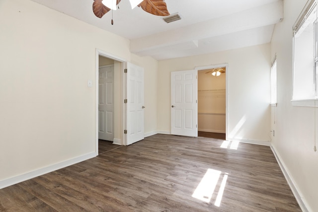 361 NE Gardner Dr, Fort Walton Beach, FL 32548 - unfurnished bedroom with wood finished floors, baseboards, a ceiling fan, and a closet