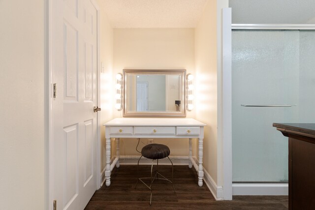 361 NE Gardner Dr, Fort Walton Beach, FL 32548 - full bath featuring wood finished floors, a stall shower, and baseboards
