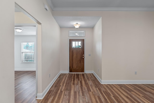 2690 Hartman Ct, Navarre, FL 32566 - entryway with plenty of natural light, dark wood-style flooring, baseboards, and ornamental molding