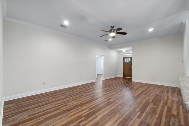 2690 Hartman Ct, Navarre, FL 32566 - unfurnished living room featuring a ceiling fan, crown molding, dark wood finished floors, baseboards, and recessed lighting
