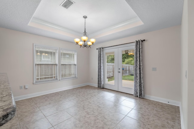 2690 Hartman Ct, Navarre, FL 32566 - interior space featuring an inviting chandelier, french doors, a tray ceiling, crown molding, and visible vents