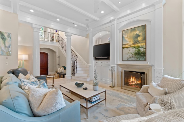 3002 Bay Villas Dr, Miramar Beach, FL 32550 - living room with beam ceiling, recessed lighting, ornamental molding, stairs, and a premium fireplace