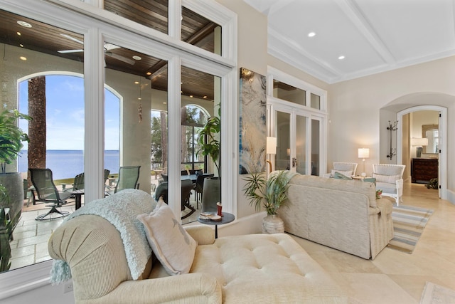 3002 Bay Villas Dr, Miramar Beach, FL 32550 - living room featuring a water view, plenty of natural light, arched walkways, french doors, and recessed lighting