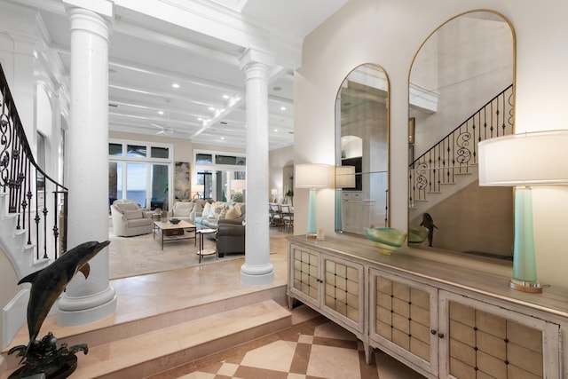 3002 Bay Villas Dr, Miramar Beach, FL 32550 - entryway featuring recessed lighting, decorative columns, and stairs