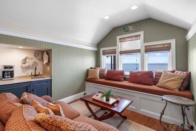 3002 Bay Villas Dr, Miramar Beach, FL 32550 - living area with wood finished floors, lofted ceiling, and wet bar