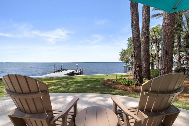 3002 Bay Villas Dr, Miramar Beach, FL 32550 - view of patio / terrace featuring a water view and a dock