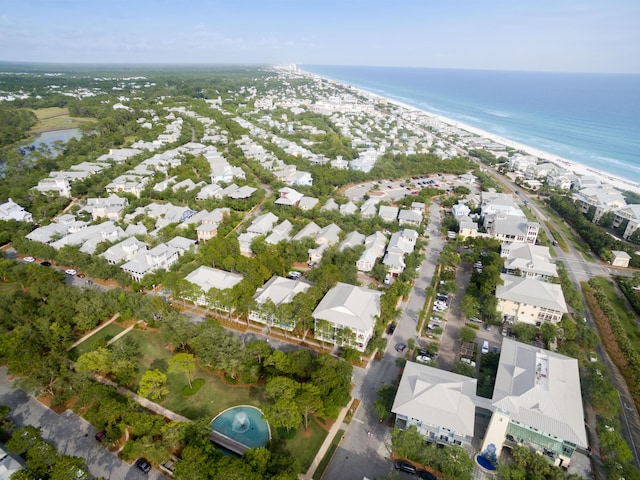 drone / aerial view featuring a water view and a residential view