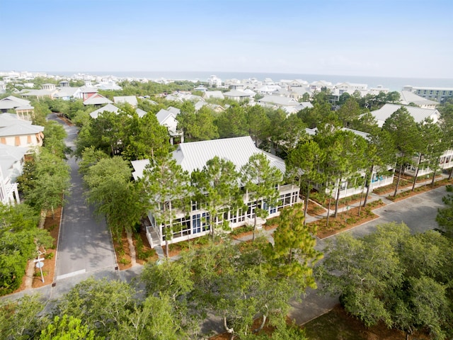 birds eye view of property featuring a water view and a residential view