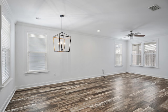 unfurnished dining area with baseboards, ornamental molding, dark wood-type flooring, and visible vents