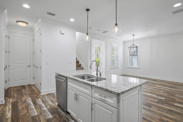 kitchen featuring stainless steel dishwasher, a sink, visible vents, and recessed lighting